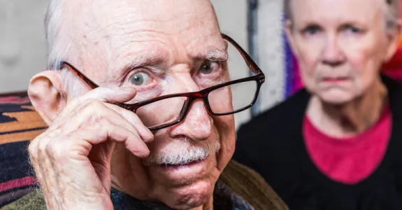 Photo of two elderly people.