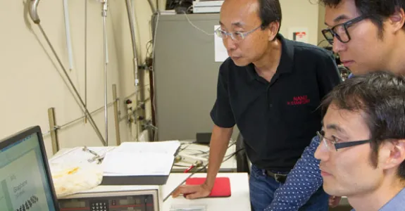 Photo of Professor H.-S. Philip Wong, graduate student Joon Sohn, and postdoctoral fellow Seunghyun Lee.