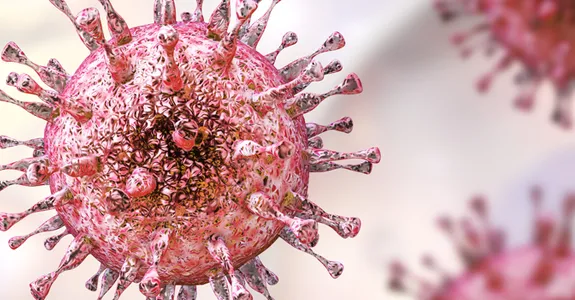 Graphic image of microbe cells in pink on a pale background.