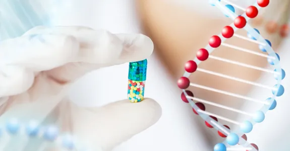 Graphic image of pill capsule and DNA.