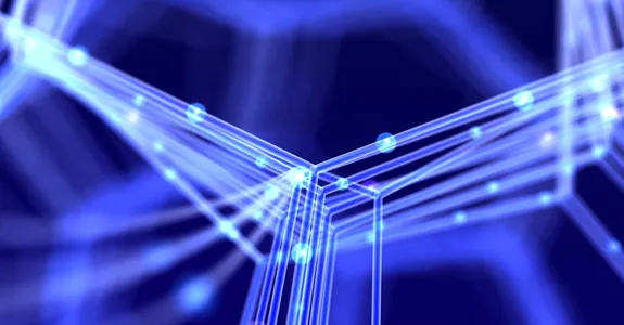 Graphic illustration of intersecting nanotubes lit up in blue against a darker background.