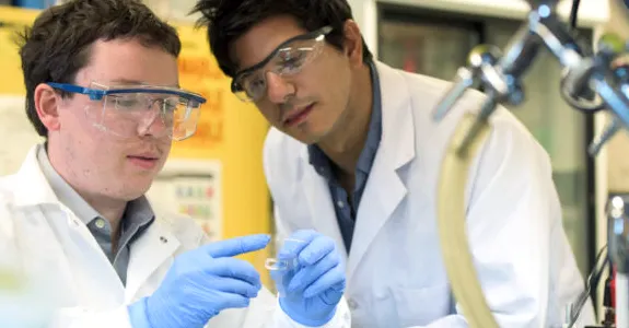 Photo of students in NeuroFab lab space.