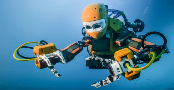 Photo of OceanOne robot in the water.
