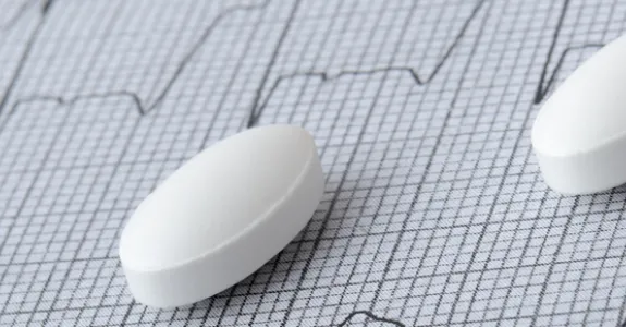 Photo of pills on a graph.