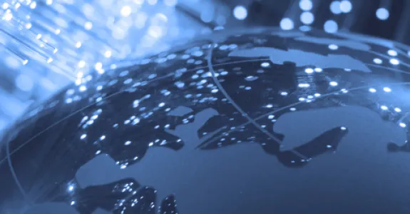 Graphic image of globe and fiber optics.