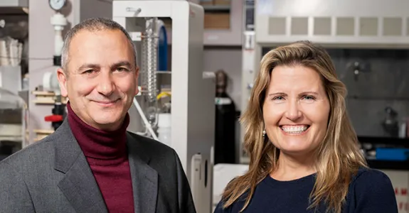 Photo of Drs. Antonio Hardan and Karen Parker standing in a laboratory space.