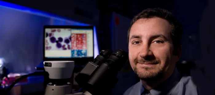 Photo of Dr. Ash Alizadeh.
