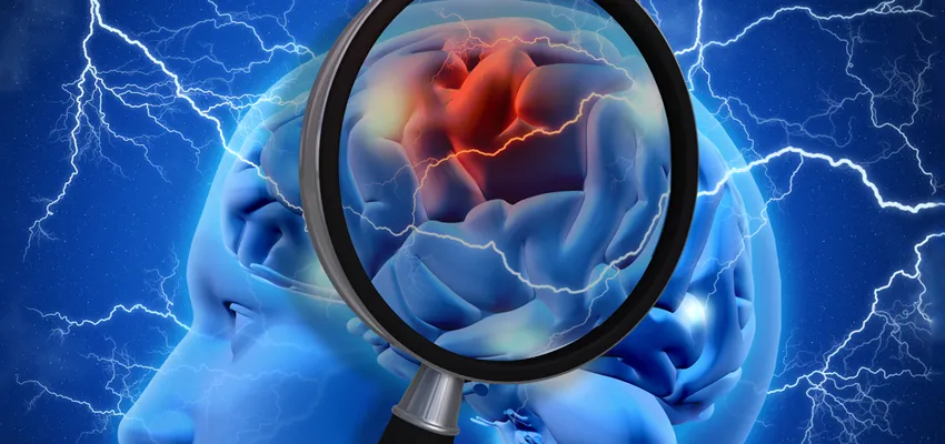 Graphic image of brain under magnifying glass.