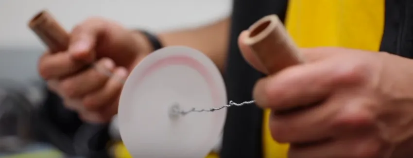Photo of Saad Bhamla using the Paperfuge.