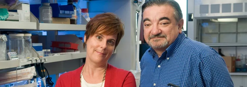 Photo of Drs. Jennifer Cochran and Amato Giaccia in the lab.