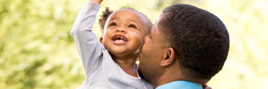 Photo of father and young daughter.