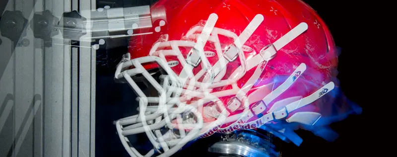 Image of helmet undergoing forces.