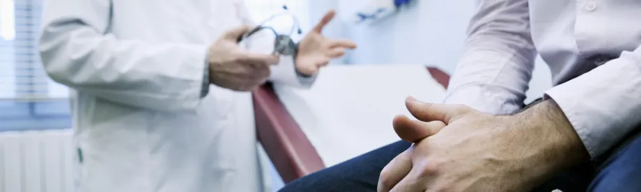 Photo of man at doctor.