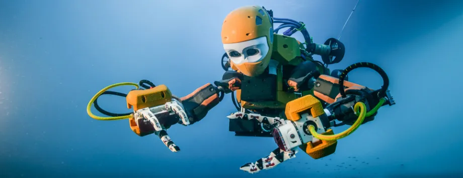 Photo of OceanOne robot in the water.